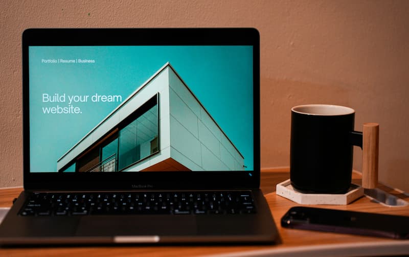 freelancer building portfolio website laptop